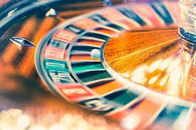 Casino slot machine game screen with reels spinning